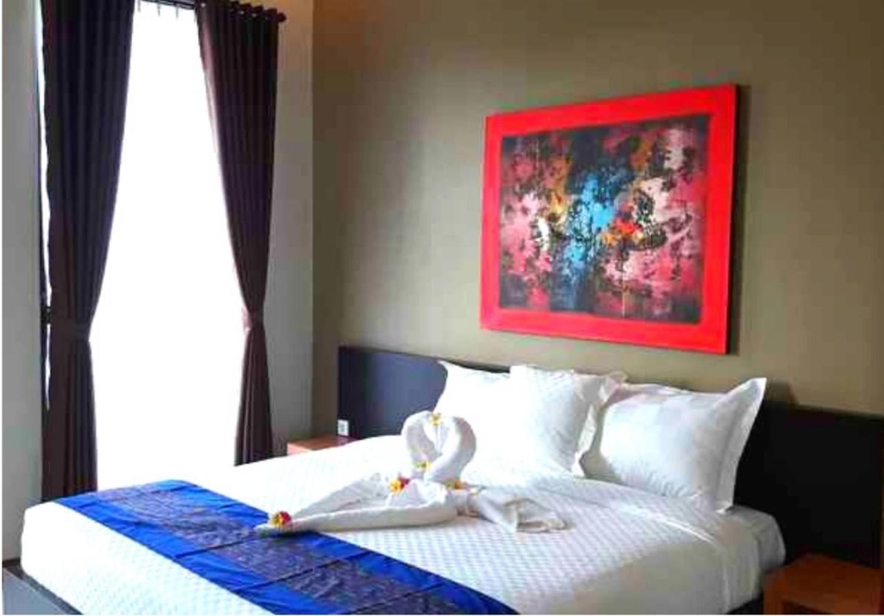 Asiana Lovina Hotel Buitenkant foto